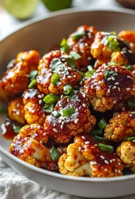 Air-fried Korean chili cauliflower with gochujang sauce on a plate