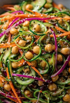 Asian Cucumber and Chickpea Slaw topped with sesame dressing