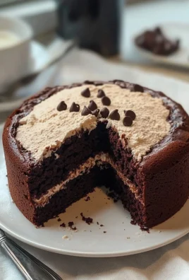Deliciously rich and moist BEST EVER Chocolate Fudge Cake served on a plate