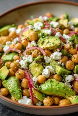 Chickpea Feta Avocado Salad with fresh ingredients in a bowl