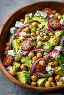 Chickpea Feta Avocado Salad with fresh vegetables and herbs