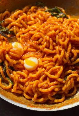 Creamy gochujang pasta with vibrant colors and a rich sauce