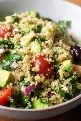 Colorful bowl of easy quinoa salad with vegetables and dressing