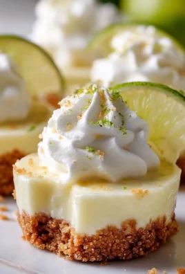 Heavenly No-Bake Mini Key Lime Pies on a plate with lime wedges
