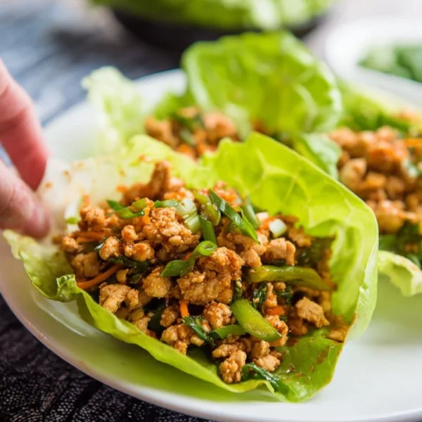 Low carb Thai chicken lettuce wraps filled with fresh ingredients