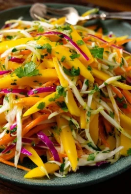 Colorful Mango Slaw with fresh ingredients ready to serve