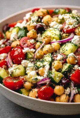 Mediterranean Chickpea Feta Salad with fresh vegetables and herbs