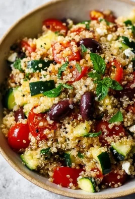 Vibrant Mediterranean Quinoa Salad with colorful vegetables and herbs
