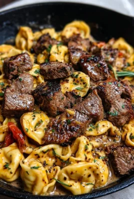 One-Pan Cowboy Butter Tortellini with Steak Bites on a plate