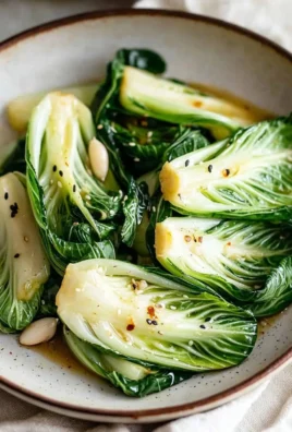 Stir-fried Baby Bok Choy with colorful vegetables in a skillet