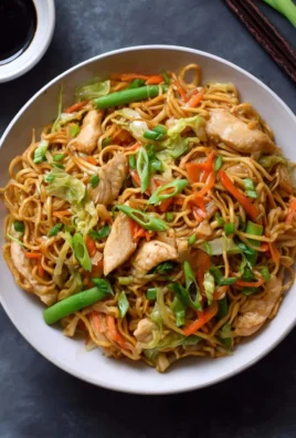 Delicious plate of easy chicken chow mein with fresh vegetables and noodles