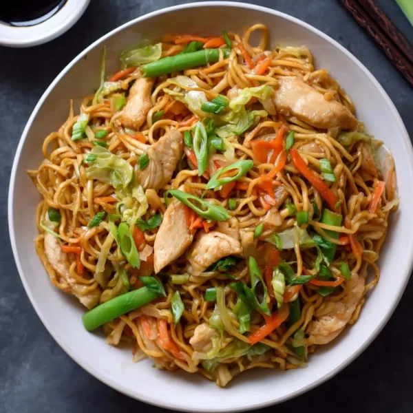 Delicious plate of easy chicken chow mein with fresh vegetables and noodles