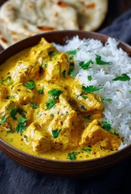 Easy homemade chicken korma served with flatbread and rice