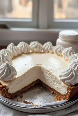 Delicious Marshmallow Whip Cheesecake topped with whipped cream and marshmallows