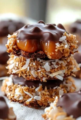 Plate of homemade No Bake Samoa Cookies with chocolate, caramel, and coconut