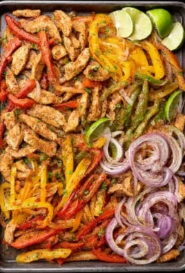 Sheet pan chicken fajitas with colorful peppers and onions ready to serve