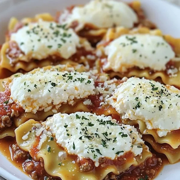 Delicious slow cooker lasagna made with layers of pasta, cheese, and sauce