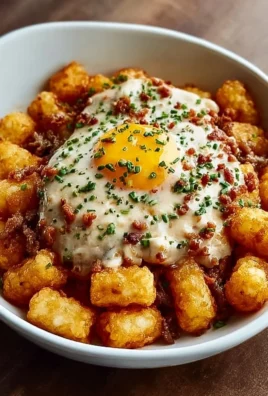 Ultimate Tater Tot Breakfast Bowl with eggs, bacon, and cheese