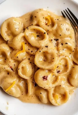 Creamy roast garlic and lemon pasta sauce served over spaghetti dish