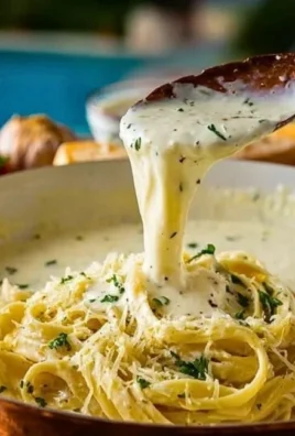 Bowl of creamy homemade Alfredo sauce ready to serve over pasta