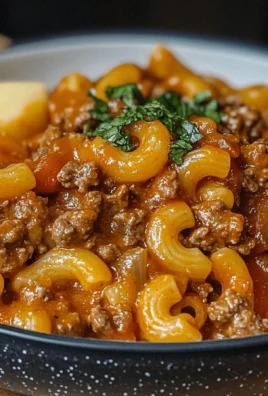 One Pot Beefaroni dish served in a bowl with cheese on top