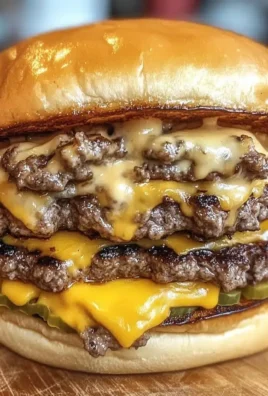 Irresistible crack burgers on a plate with toppings and condiments