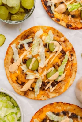 Healthy smash burger tacos with fresh toppings and vibrant colors