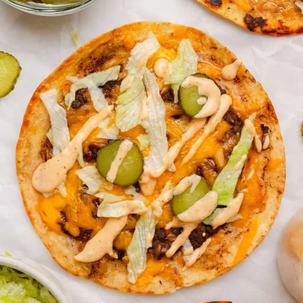 Healthy smash burger tacos with fresh toppings and vibrant colors