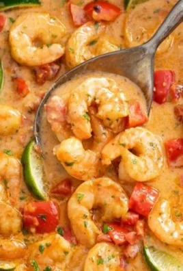 Delicious Cajun shrimp served with spices and herbs, a flavorful seafood dish