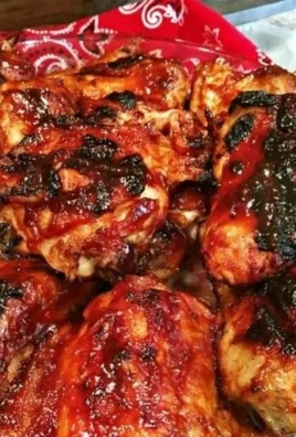 Grilled Cherry Dr. Pepper BBQ chicken served on a plate with garnishes