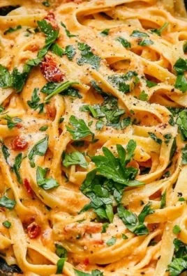 Creamy vegan sun-dried tomato pasta dish served in a bowl