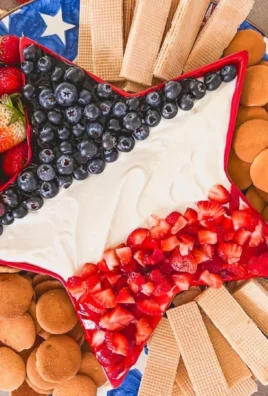 Star Spangled Cheesecake Dip with red, white, and blue toppings for festive occasions