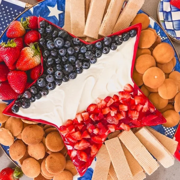 Star Spangled Cheesecake Dip with red, white, and blue toppings for festive occasions
