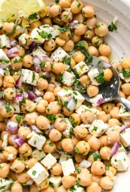 Lemony Chickpea Feta Salad in a bowl with fresh ingredients