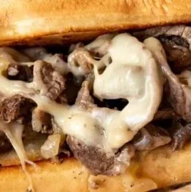 Delicious homemade Philly Cheesesteak loaded with steak and cheese