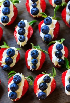 Delicious red, white, and blue cheesecake strawberries dessert for summer events.