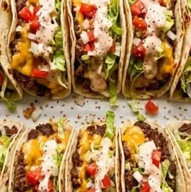 Delicious Smash Burger Tacos served on a plate with toppings
