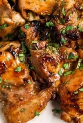 Delicious Thai grilled chicken garnished with herbs and spices