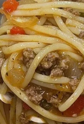 Viral Dirty Spaghetti dish topped with sauce and fresh herbs