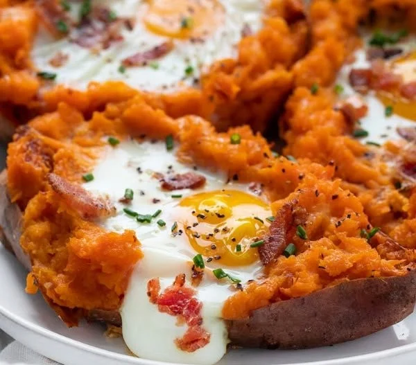 Deliciously prepared breakfast sweet potato topped with healthy ingredients