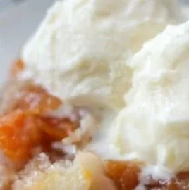 Homemade peach cobbler made with fresh peaches and a golden crust.