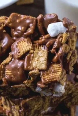 Delicious Golden Grahams S'Mores Bars featuring layers of chocolate and marshmallows