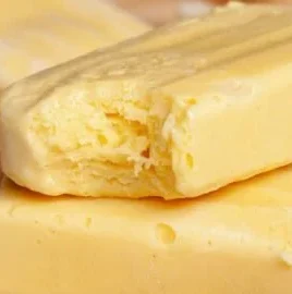 Homemade mango popsicles made with ripe mangoes, perfect summer treat.