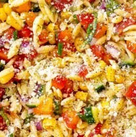 Summer Orzo Pasta Salad with colorful vegetables and dressing