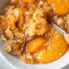Delicious Southern peach cobbler with fresh peaches and golden crust
