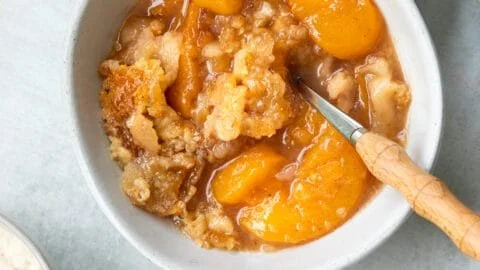 Delicious Southern peach cobbler with fresh peaches and golden crust